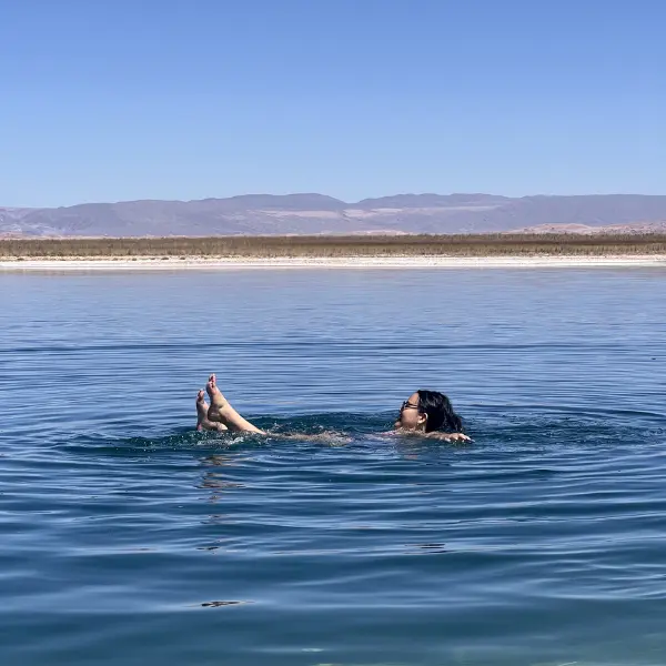 floating in Laguna Cejar salt lake Atacama Chile