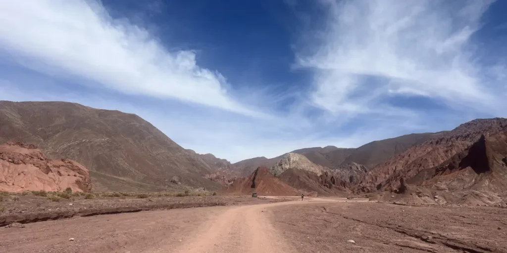 unmarked desert road inside Valle del Arcoiris no signs Atacama